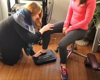 patients foot being placed into the orthotic pin machine to help with their bunions