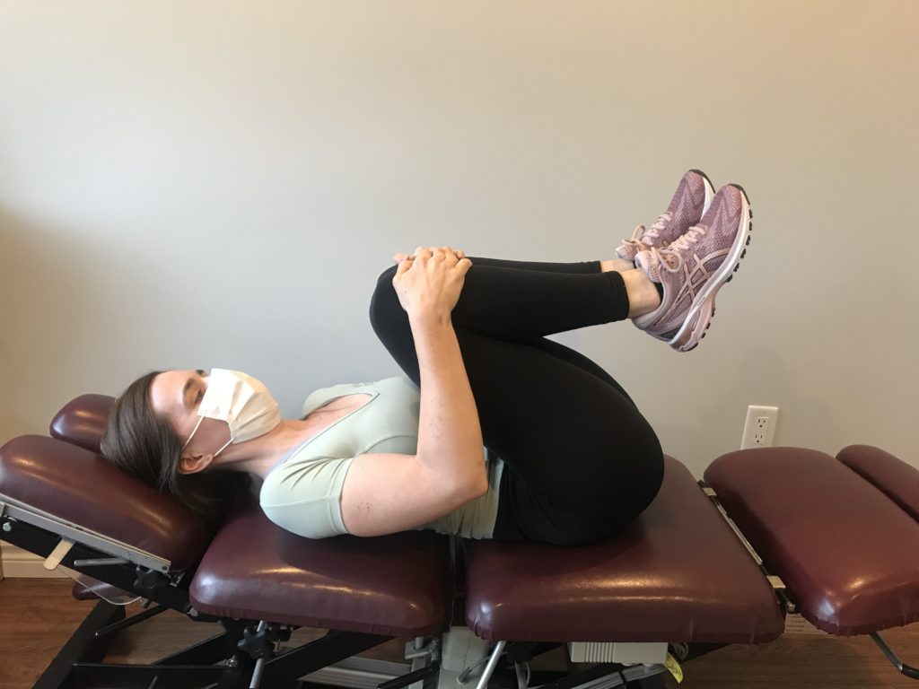 Oakville chiropractor double knee to chest stretch