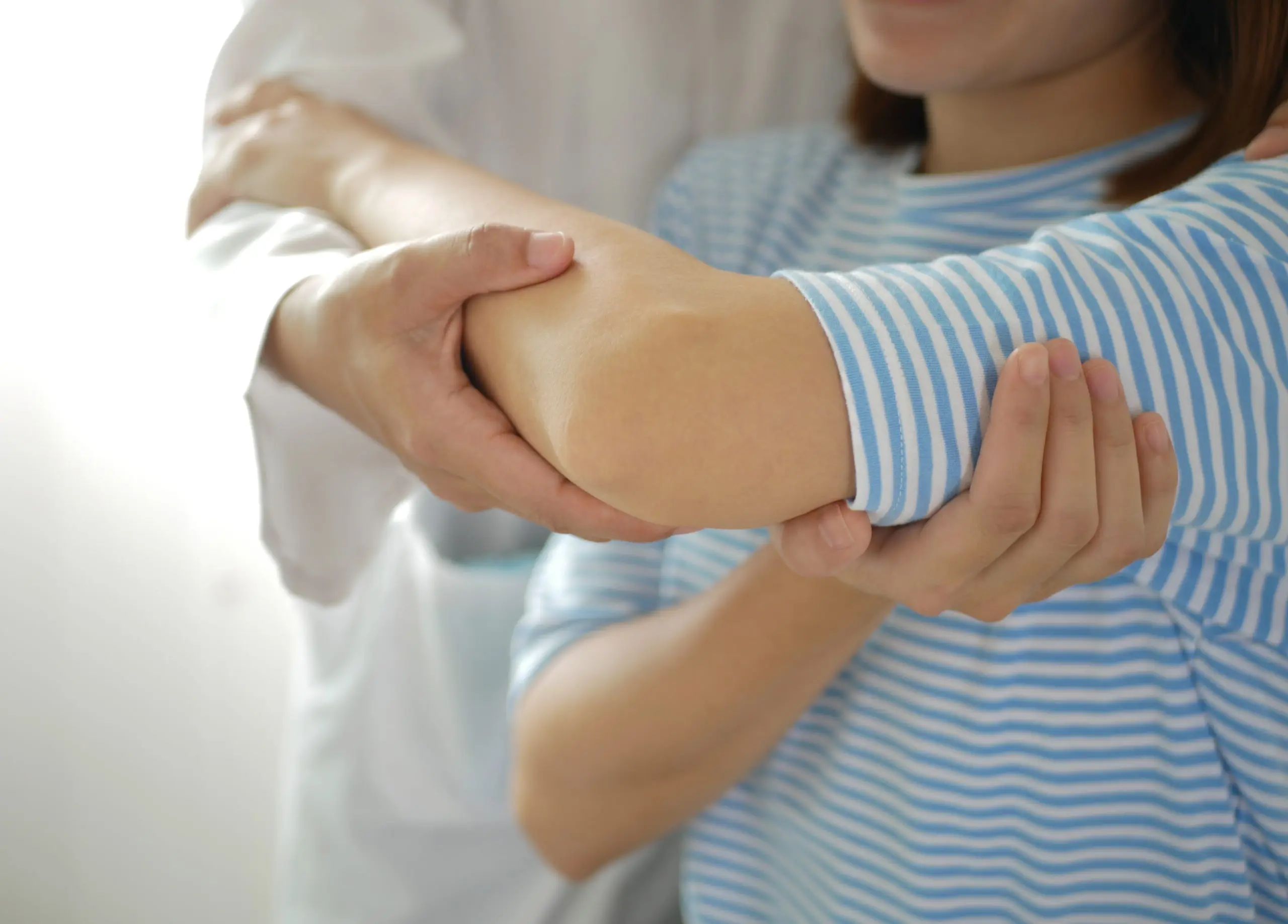 Elbow physiotherapy treatment for injury and pain management.